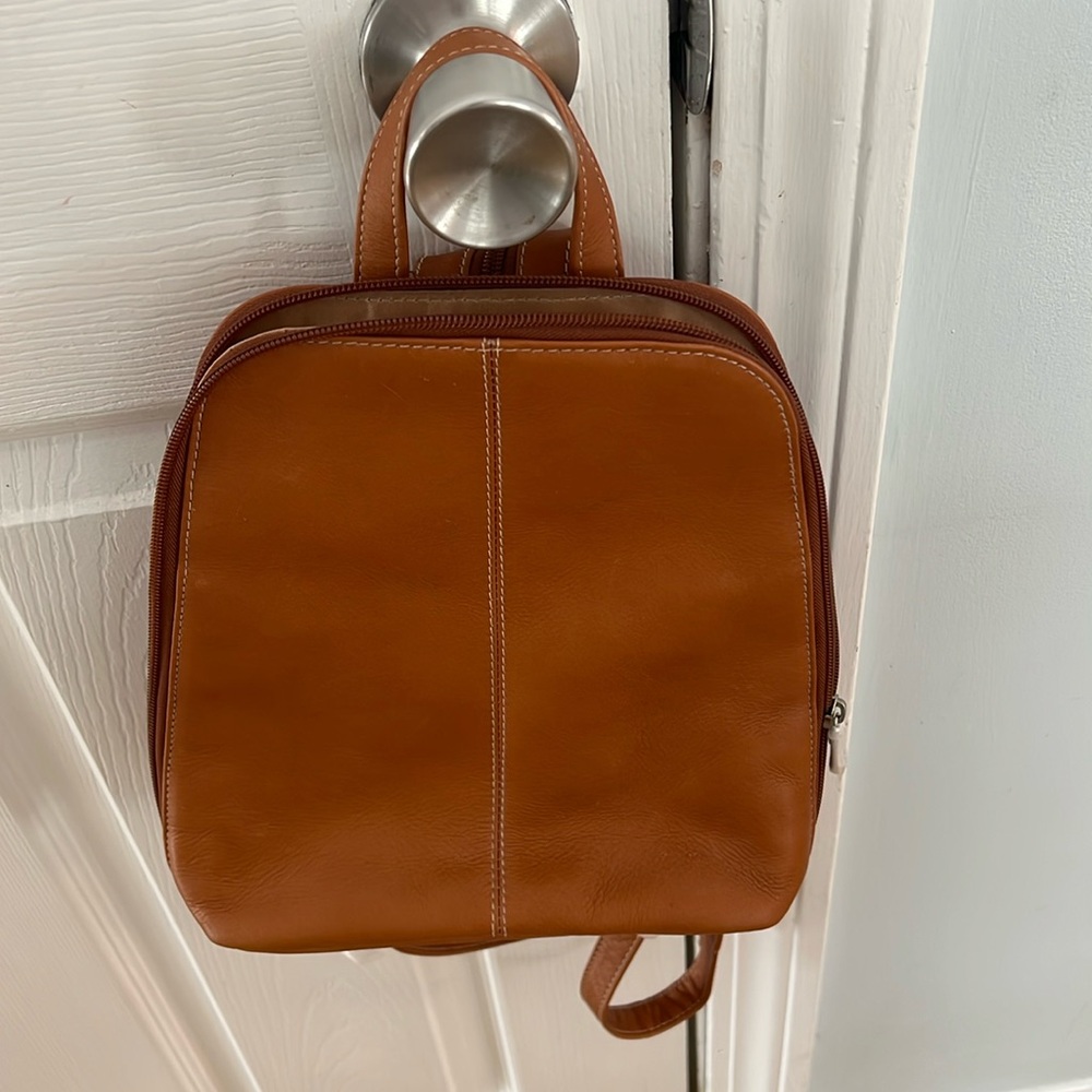 Rand new backpack style leather pocketbook
